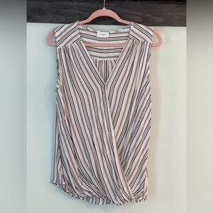 Sleeveless shirt, light, breathable fabric, great business builder piece